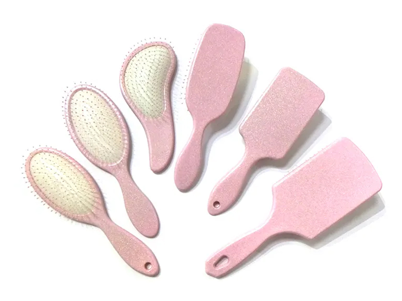 Vaaleanpunainen muovinen Fancy Paddle -hiusharja