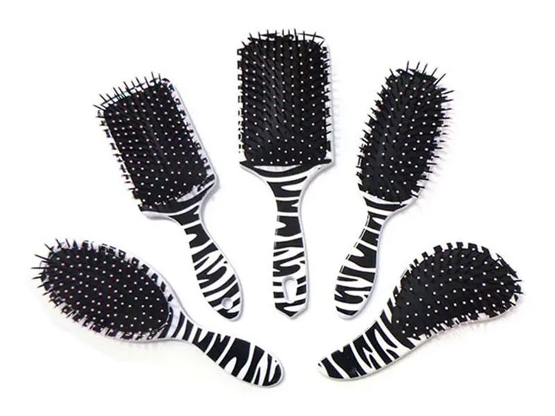 Detangling Paddle Deman muovinen hiusharja