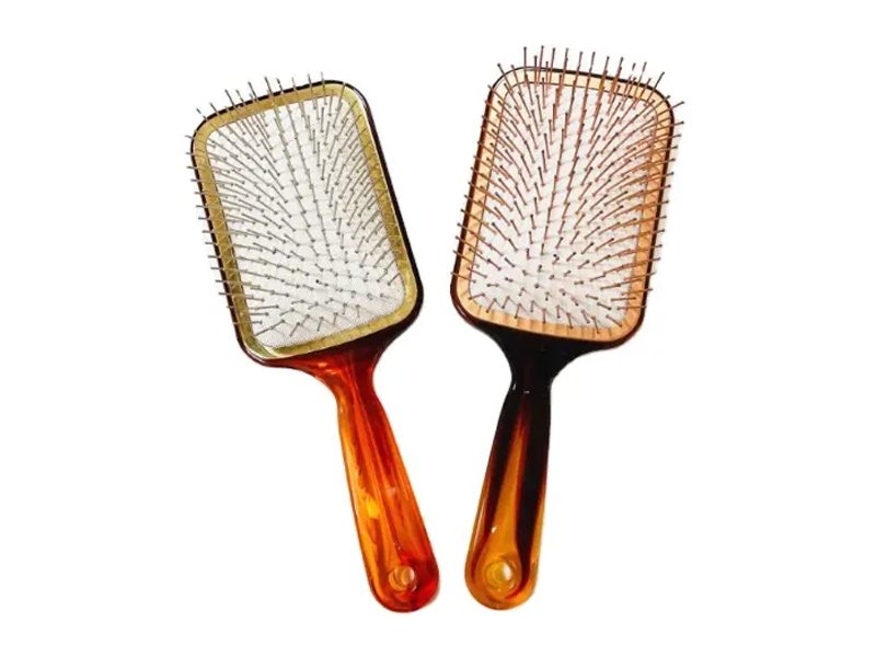 Amber Color Paddle -hiusharja metallineuloilla