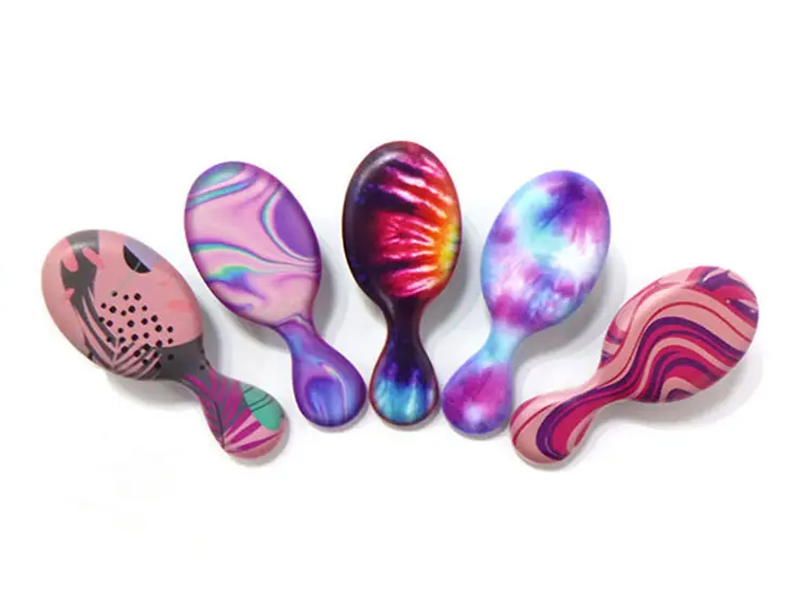 Baby Detangling Paddle Hair Massager värjäyskampa